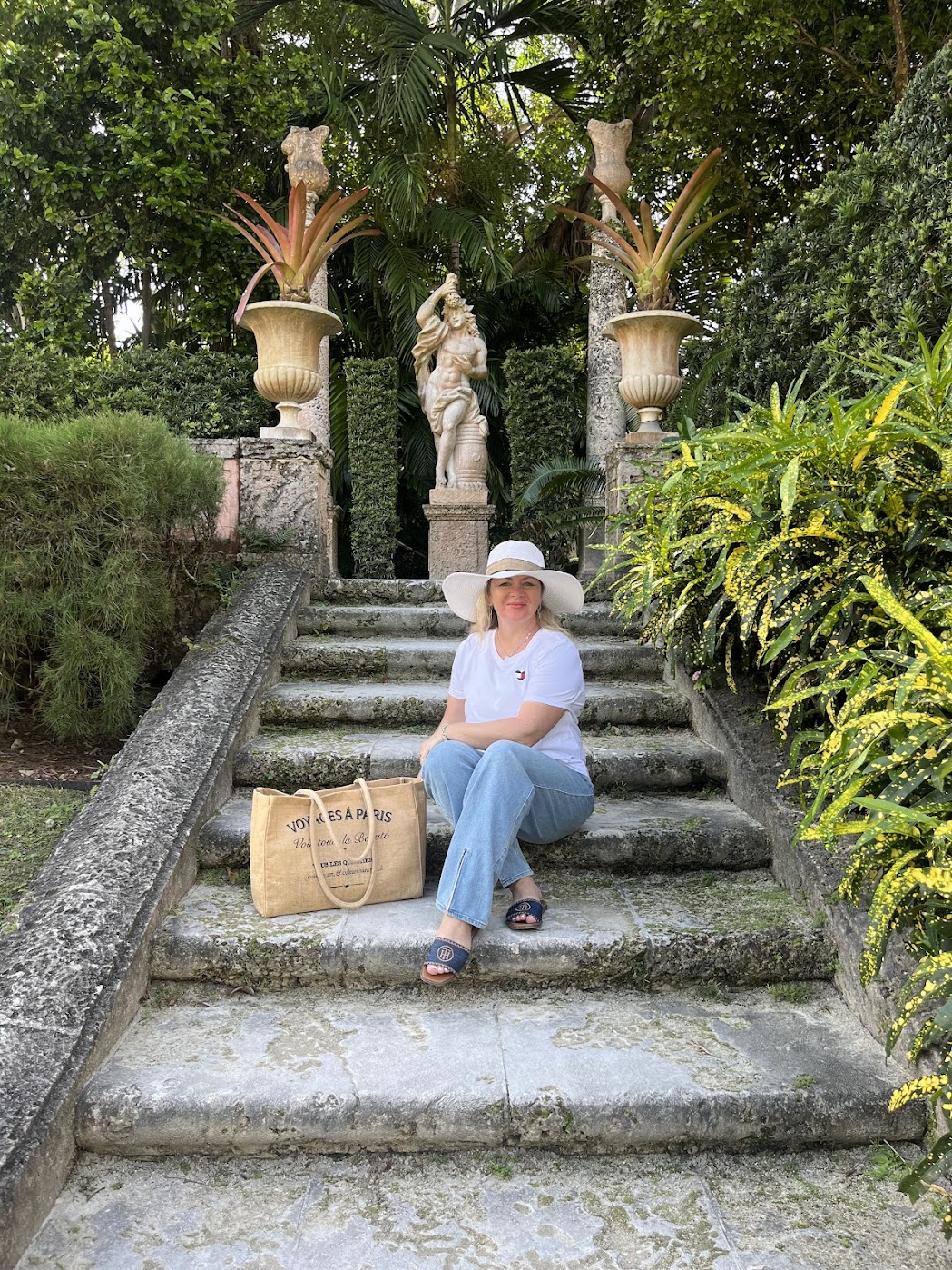 A woman sitting on a stairway