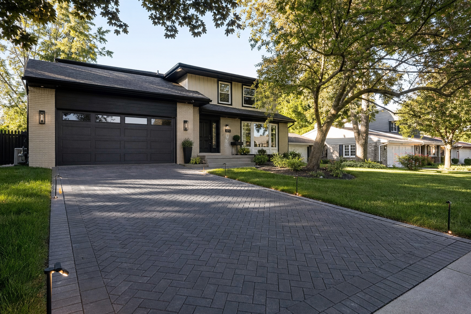Landscape design near Audubon Park in Elk Grove Village, paver driveway installation in herringbone pattern