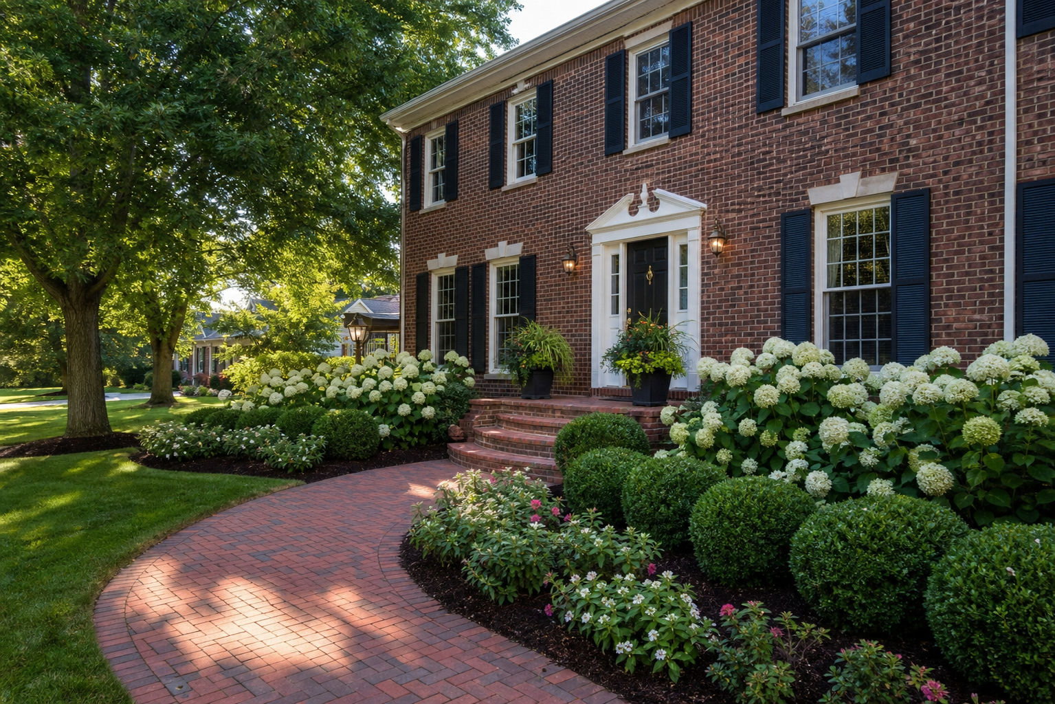 Landscape design near White Oaks Nature Park in Wood Dale, refreshed front yard on a brick colonial home under oak canopy